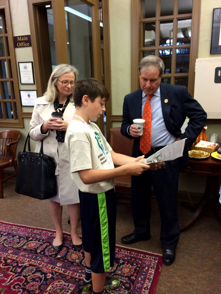 Congressman Yarmuth meeting with a student