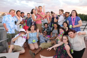 Group of students posing together and laughing