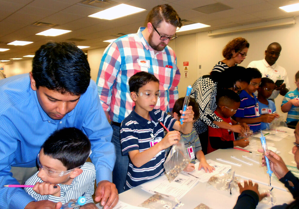 Kids at energy-themed bring your child to work day