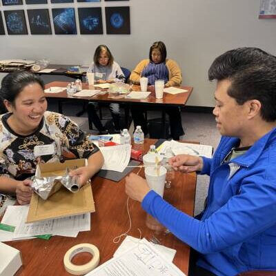 Two teachers working together at a table