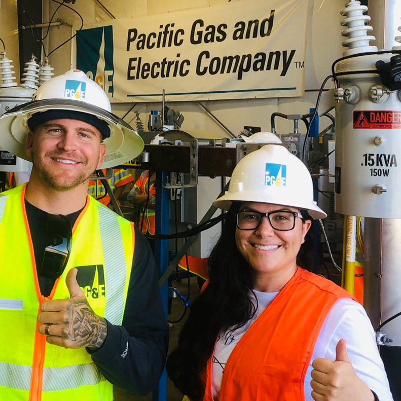 A high school student and PG&E worker inside a power plant